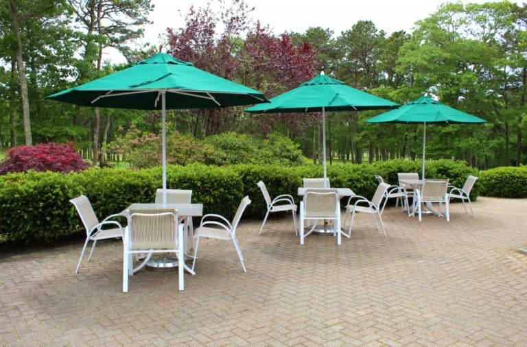 outside deck with green umbrellas