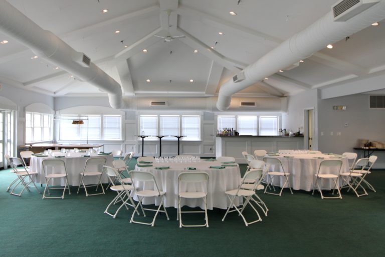 simple white table settings for a wedding
